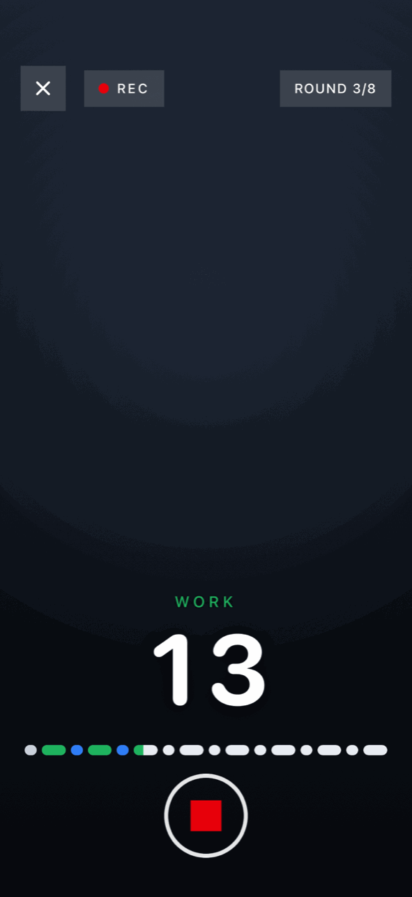 Recording a workout: REC indicator, round 3 of 8, live WORK countdown over the camera view